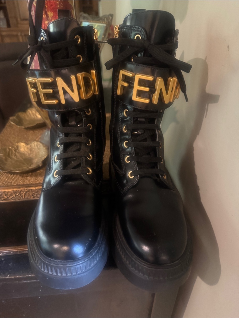 Fendi Black Leather Lace-Up Boots with Gold Logo Strap